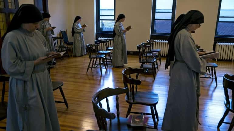 The Community of Franciscan Sisters of the Renewal celebrates Mass...