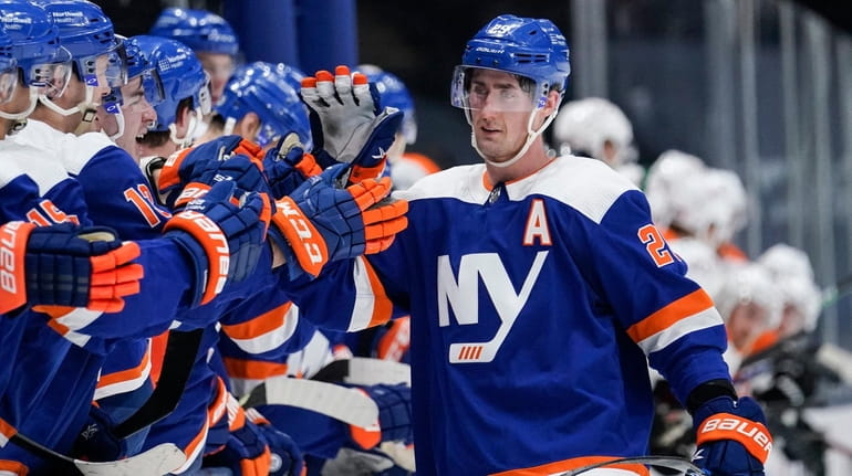 Islanders' Brock Nelson (29) celebrates with teammates after scoring during...