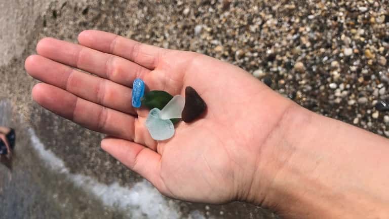 Crafter and artist Robyn Romanoff hunts for sea glass at...