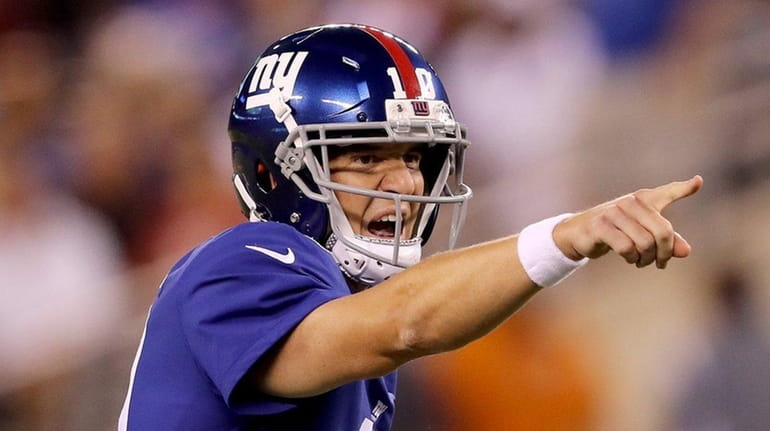 Eli Manning of the New York Giants calls out the...