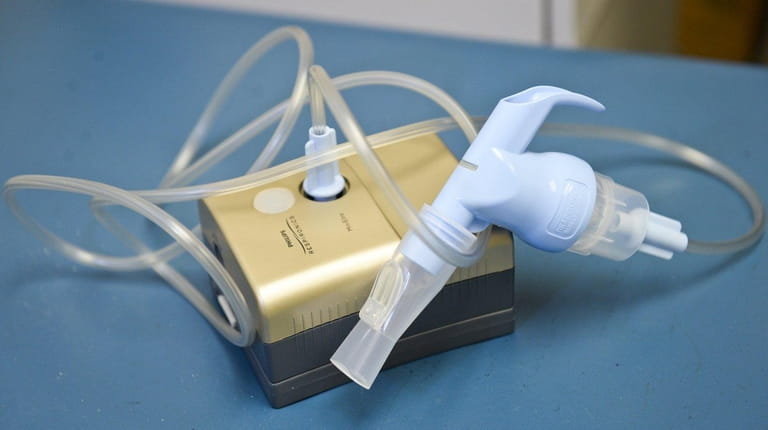 An asthma-controlling nebulizer machine inside asthma specialist Dr. Harvey Miller's...
