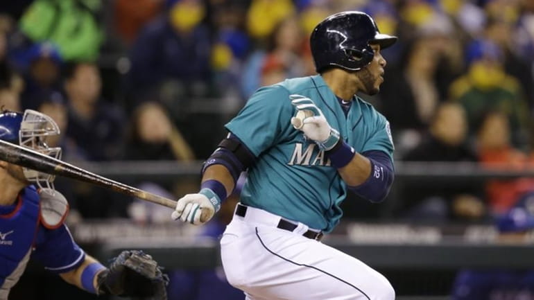 Seattle Mariners' Robinson Cano doubles in a pair of runs...