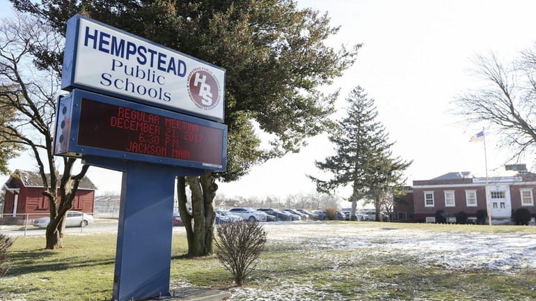 A sign for Hempstead schools outside the district office in...