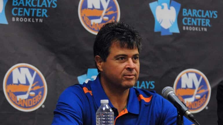 Islanders head coach Jack Capuano fields questions from the media...