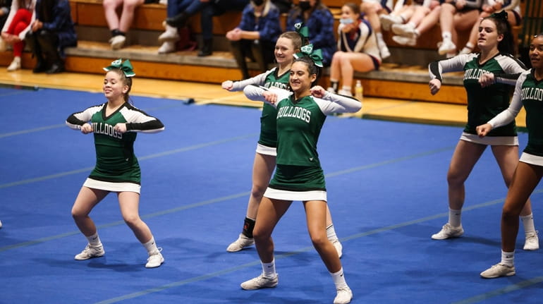 The Lindenhurst Bulldogs cheerleading team during a competition at Longwood...