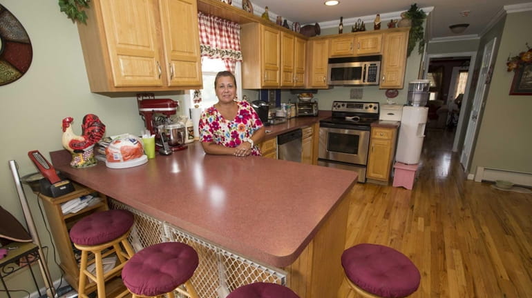 Katerina Filippides in the kitchen of her East Marion home....