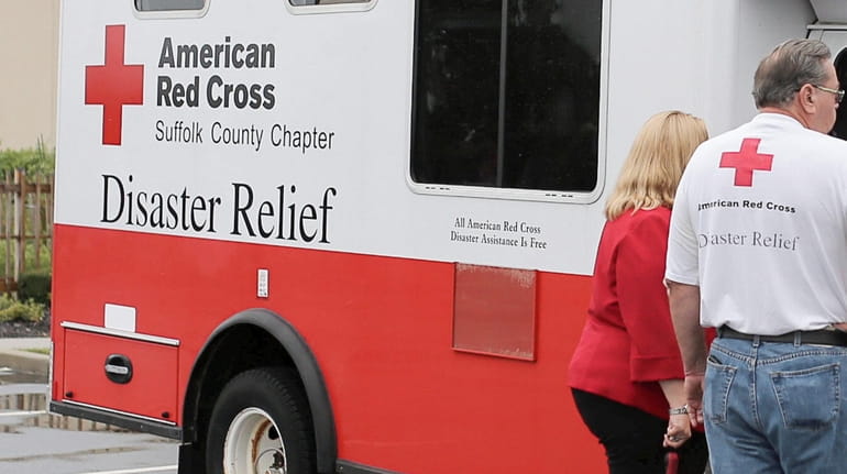 An American Red Cross Disaster Relief vehicle outside the United...
