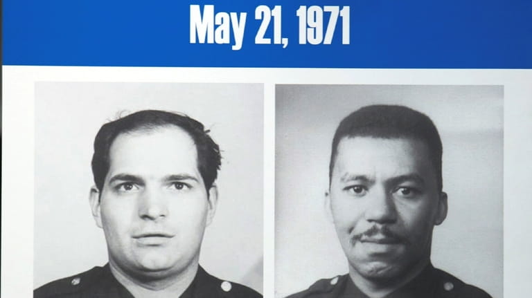 A poster, seen in 2014, showing NYPD Officers Joseph Piagentini and Waverly...