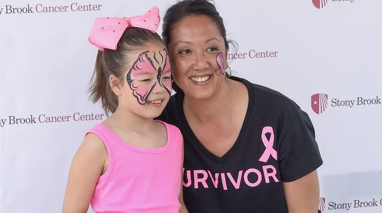 Cancer survivor Janeen Fink of Farmingville with daughter Taylor, 8,...