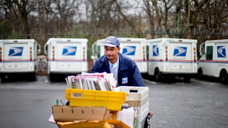 A U.S. Postal Service letter carrier in Atlanta.