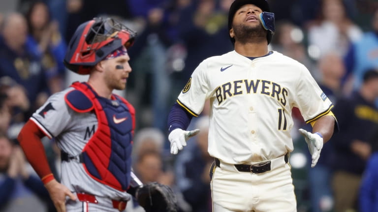 Milwaukee Brewers' Jackson Chourio reacts after hitting a home run...