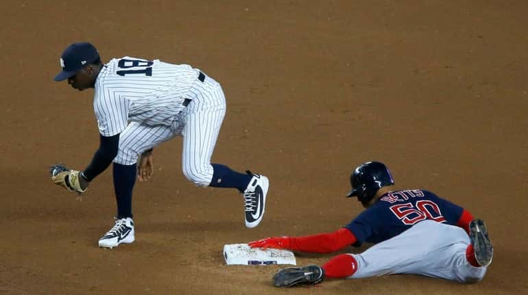 Mookie Betts steals second, beating the throw to Didi Gregorius...