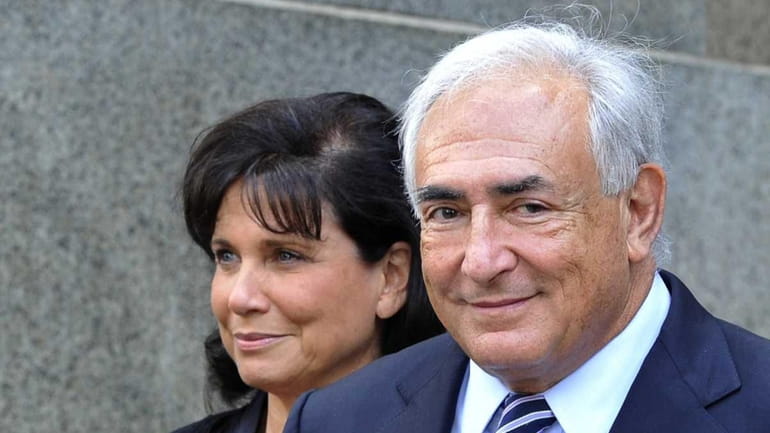 Dominique Strauss-Kahn and his wife Anne Sinclair leaving the Manhattan...