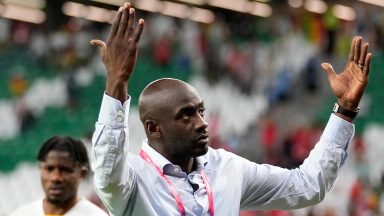 Ghana's head coach Otto Addo celebrates after the World Cup...