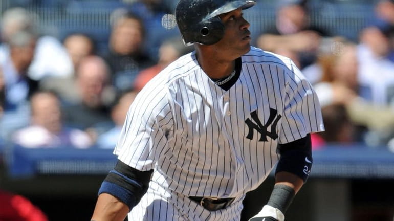 New York Yankees second baseman Robinson Cano (24) after hitting...