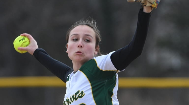 Ward Melville pitcher Kristina Maggiacomo delivers a pitch against Bay...