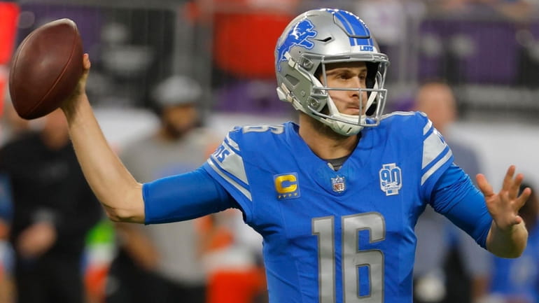 Lions quarterback Jared Goff throws a pass during the first half...