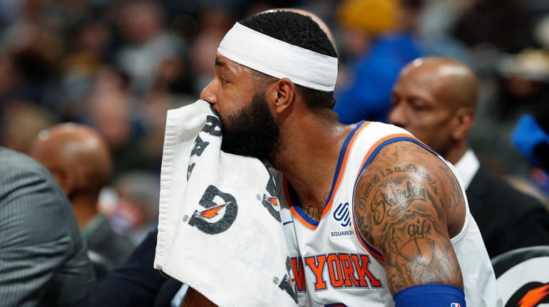 Knicks forward Marcus Morris Sr. looks on from the bench...
