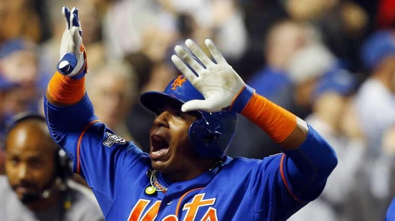 Yoenis Cespedes #52 of the New York Mets celebrates his...