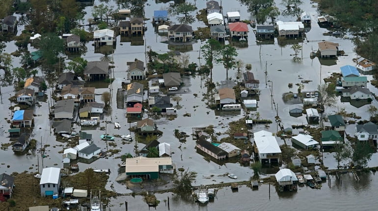 Floodwaters slowly recede in the aftermath of Hurricane Ida in...