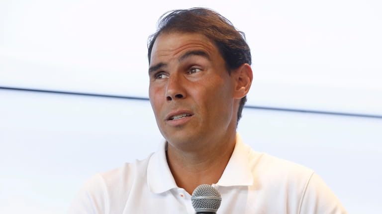 Spain's Rafael Nadal speaks during a press conference at his...