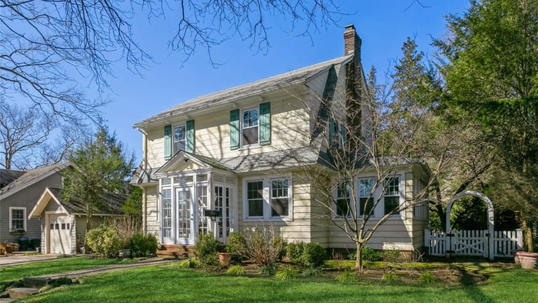 Priced at $859,000, this Colonial on Virginia Road features a...