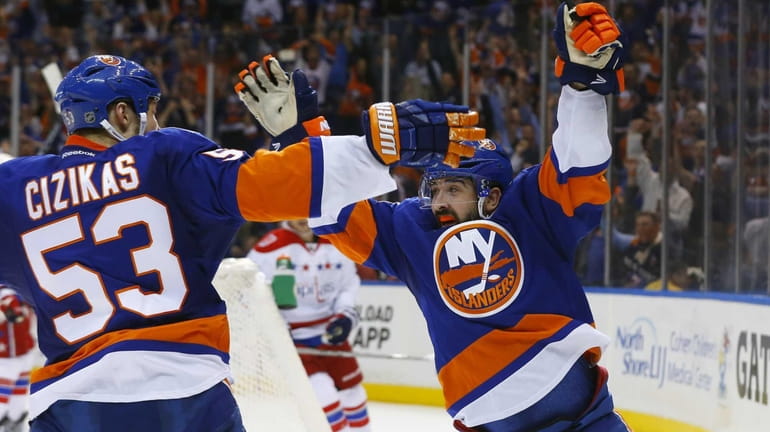Cal Clutterbuck of the New York Islanders celebrates a first-period...