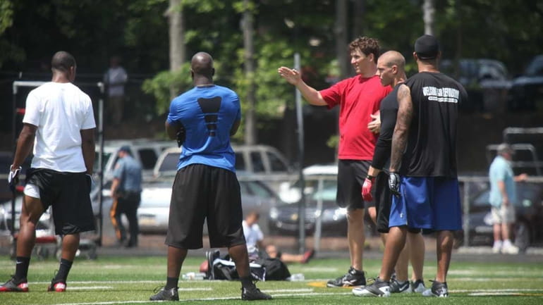 Eli Manning during a practice at Bergen Catholic High School...