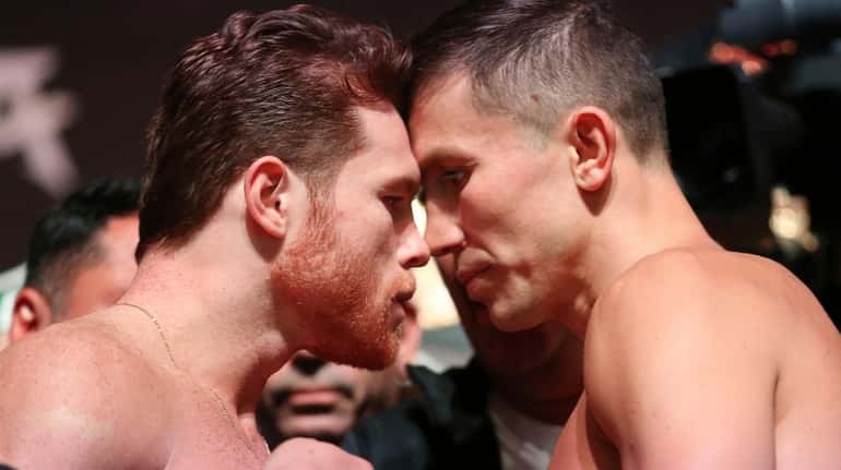 Canelo Alvarez, left, and Gennady Golovkin pose during a weigh-in...