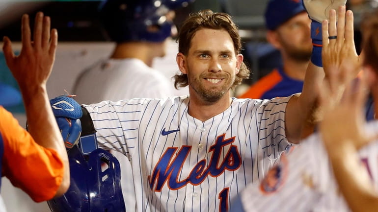 Jeff McNeil of the Mets celebrates his fourth-inning home run against...