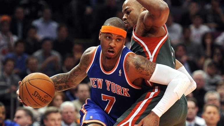 The New York Knicks' new star Carmelo Anthony driving to...