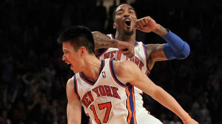 Jeremy Lin of the New York Knicks celebrates a basket...