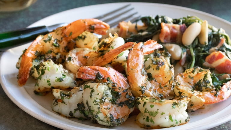 Shrimp tossed with fresh herbs, lemon and olive oil is...