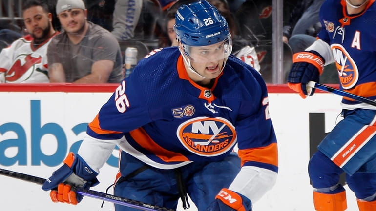 Oliver Wahlstrom #26 of the New York Islanders skates against...