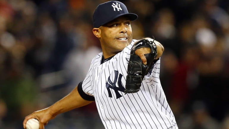 Mariano Rivera of the Yankees pitches in the ninth inning...