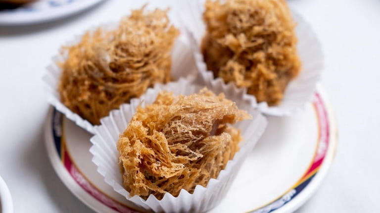 Crispy taro cake comes with minced meat or shrimp inside at Fortune...