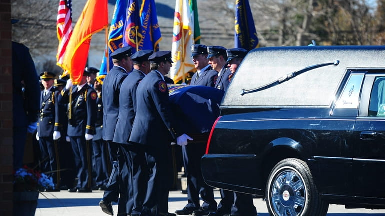 Funeral services for Nassau Police Officer Michael J. Califano at...