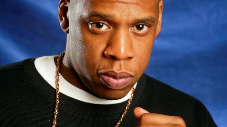 In 2001, rap artist Jay-Z poses at the Giraffe Hotel.