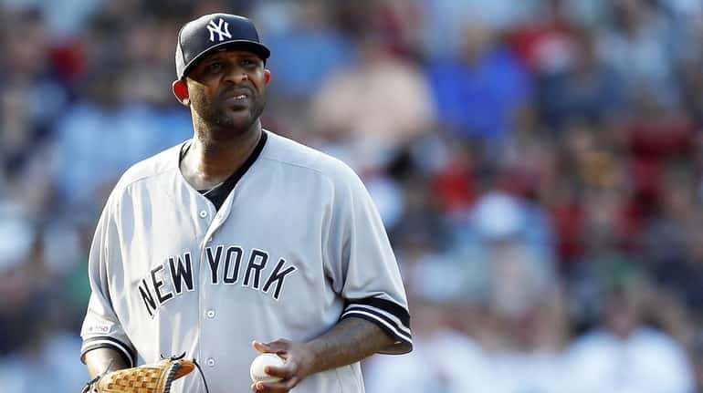 Yankees' CC Sabathia stands on the mound during the fifth...