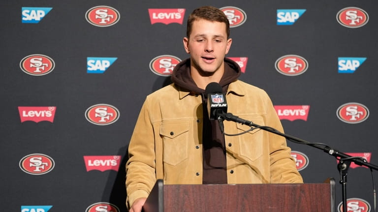 San Francisco 49ers quarterback Brock Purdy addresses the media after...