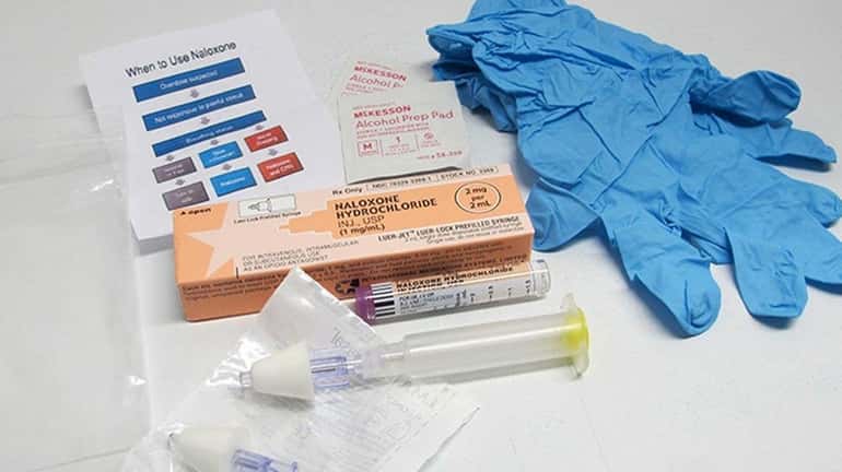 The contents of a drug overdose rescue kit is seen...