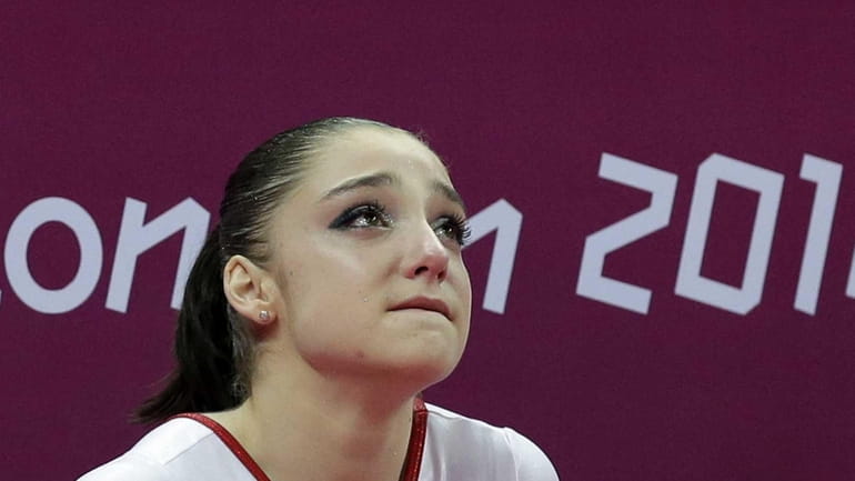 Russian gymnast Aliya Mustafina after her team's final performance. (July...