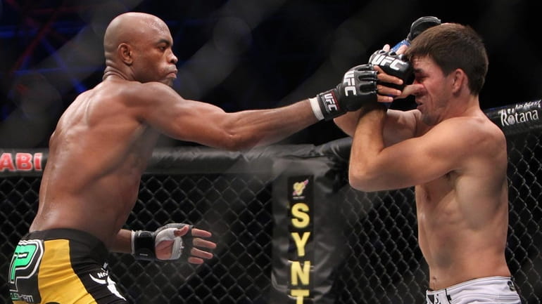 Anderson Silva, left, easily won a unanimous decision over Demian...