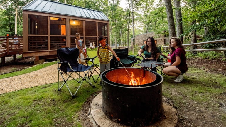Campers roast marshmallows at Wildwood State Park in Wading RIver.