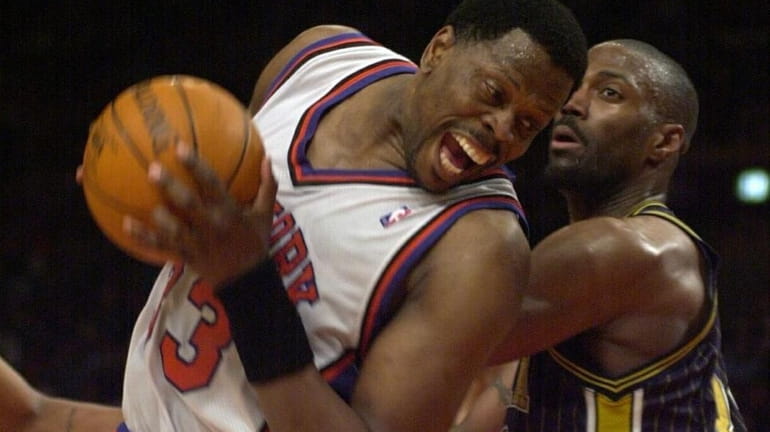 Patrick Ewing tries to get by the Indiana Pacers' Dale...
