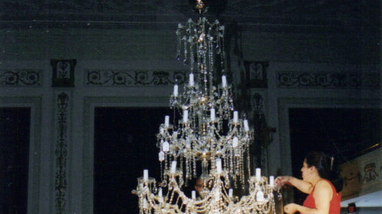 Installing the theater's $35,000-plus chandelier from Valencia, Spain, took two weeks because...