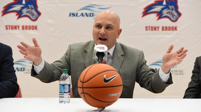 Stony Brook men's basketball head coach Geno Ford speaks at...