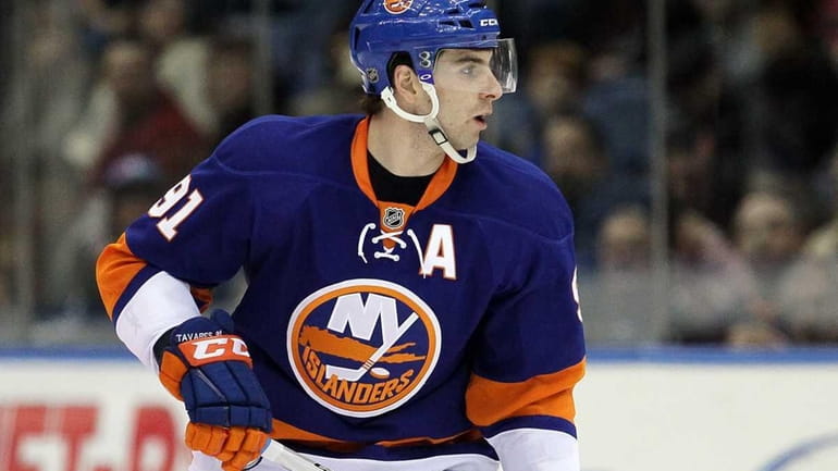 John Tavares #91 of the New York Islanders skates against...