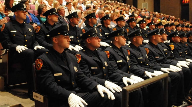 Suffolk County police graduates at the Staller Center at Stony...