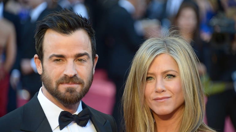 Jennifer Aniston and Justin Theroux on the red carpet for...